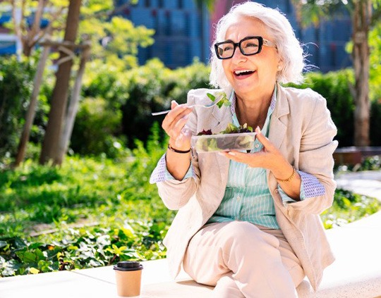 Lady enjoys salad