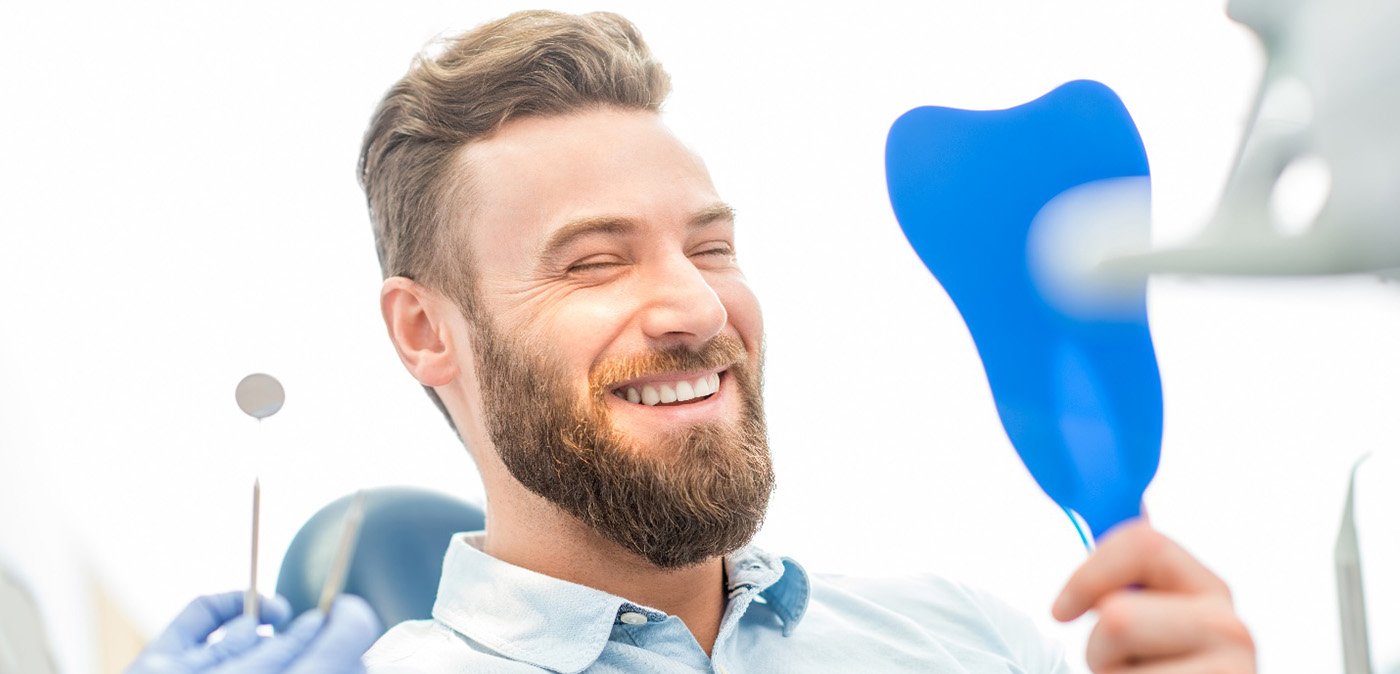 Charlotte patient smiling after dental bonding 