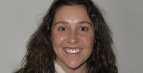 Woman smiling after Invisalign treatment