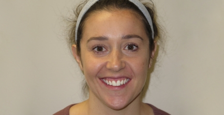 Woman smiling before Invisalign treatment