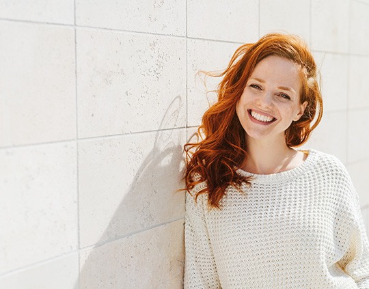 Woman smiling outside