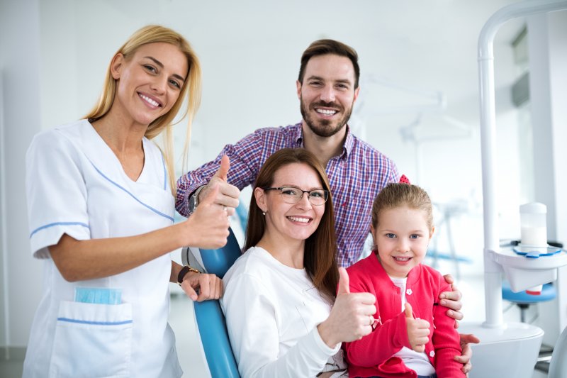 a family dentist smiling